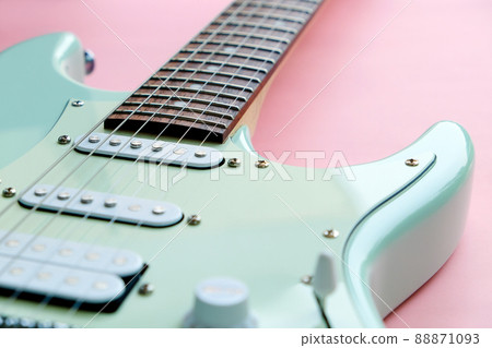 Mint Green Electric Guitar on a Pink  88871093