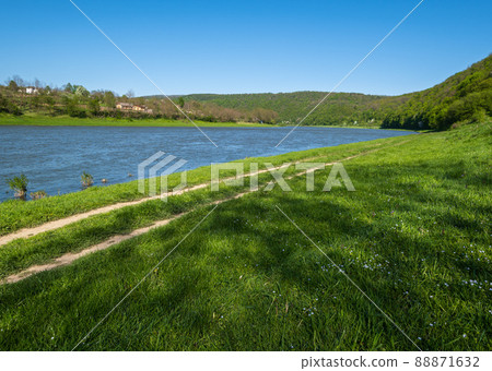 Amazing spring view on the Dnister River Canyon. View from Nezvysko village blossoming river coast,.Ivano-Frankivsk region, Ukraine Amazing spring view on the Dnister River Canyon. View from Nezvysko village blossoming river coast,.Ivano-Frankivsk region, Ukraine 88871632