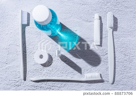 Personal dental hygiene accessories. Mouthwash, toothbrush, toothpaste and dental floss. Personal dental hygiene accessories. Mouthwash, toothbrush, toothpaste and dental floss. 88873706