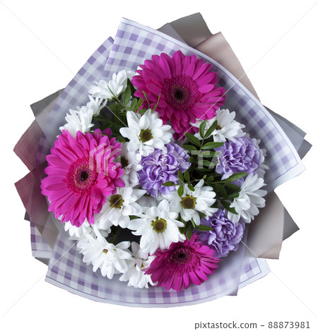 Bouquet of gerbera, daisies and carnations in a package on a white background Bouquet of gerbera, daisies and carnations in a package on a white background 88873981
