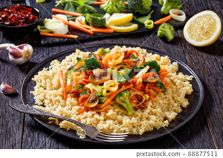 quinoa with fried veggies, mushrooms on plate quinoa with fried veggies, mushrooms on plate 88877511
