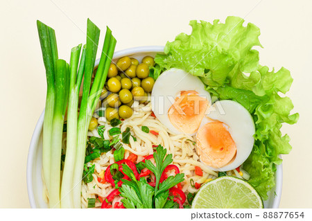 Noodle Dish with Green Onions, Eggs, Green Pea, Red Hot Pepper, Greens and Lime Noodle Dish with Green Onions, Eggs, Green Pea, Red Hot Pepper, Greens and Lime 88877654