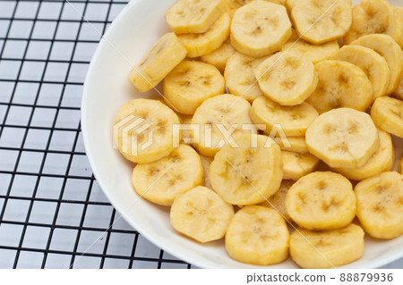 Banana slices isolated on white background 88879936