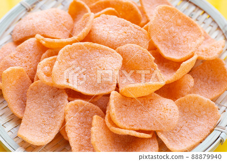 Prawn crackers on white background. Shrimp crispy rice snack 88879940