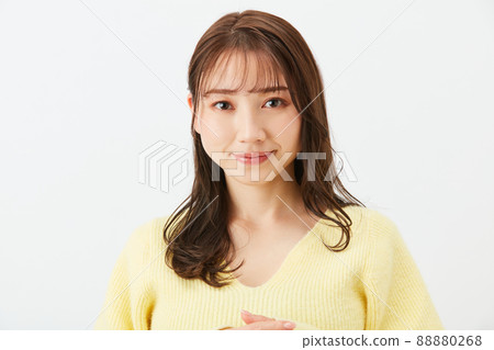 Young woman in yellow knit girly fashion bangs see-through bang Young woman in yellow knit girly fashion bangs see-through bang 88880268