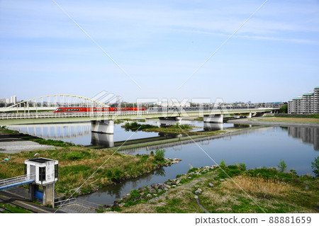 April Komae 177 小田急線 Romance Car 70000 GSE Car and Tama River Bridge 88881659