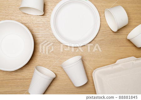 Eco friendly concept, Food container set and paper cup of biodegradable on wooden background Eco friendly concept, Food container set and paper cup of biodegradable on wooden background 88881845