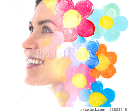 Paintography. Colorful flowers combined with a portrait of a charming woman Paintography. Colorful flowers combined with a portrait of a charming woman 88883246