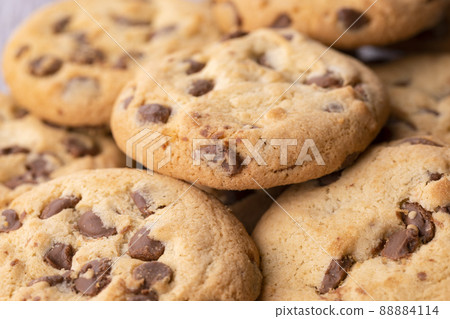 Cookies with chocolate closeup. Homemade cookies. A mountain of cookies. Cookies with chocolate closeup. Homemade cookies. A mountain of cookies. 88884114