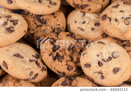 Cookies with chocolate closeup. Homemade cookies. A mountain of cookies. Cookies with chocolate closeup. Homemade cookies. A mountain of cookies. 88884115