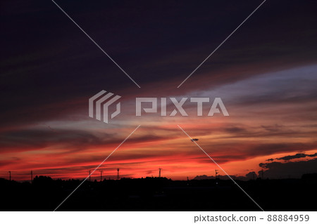 The sky dyed red in the setting sun 88884959