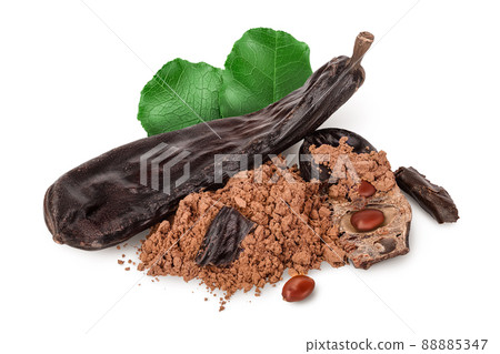 Carob pod and powder isolated on white background with clipping path and full depth of field. Carob pod and powder isolated on white background with clipping path and full depth of field. 88885347