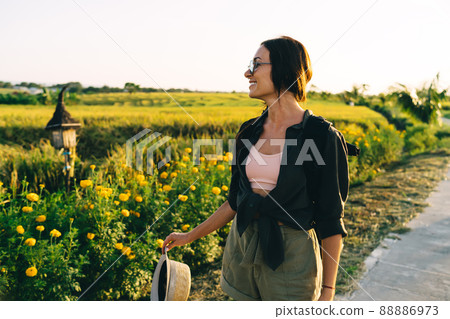 Good looking female tourist 20s recreating during getaway wanderlust journey 88886973