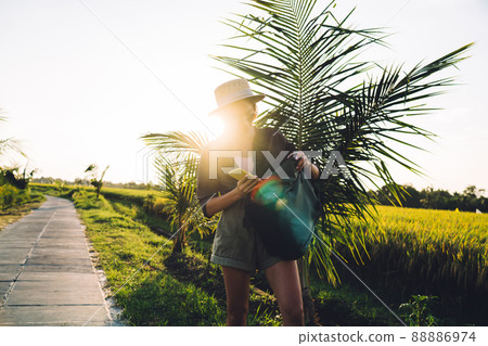 Caucasian hipster girl dressed in casual outfit take smartphone 88886974