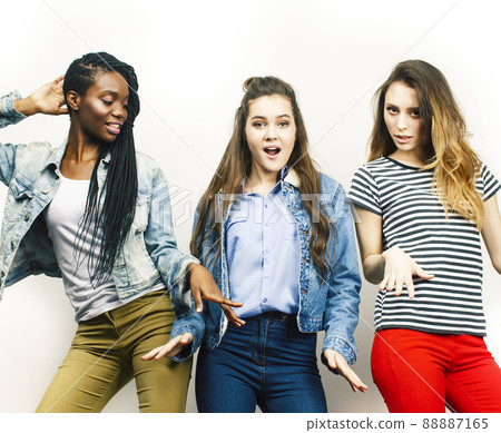 diverse multi nation girls group, teenage friends company cheerful having fun, happy smiling, cute posing isolated on white background, lifestyle people concept, african-american and caucasian diverse multi nation girls group, teenage friends company cheerful having fun, happy smiling, cute posing isolated on white background, lifestyle people concept, african-american and caucasian 88887165