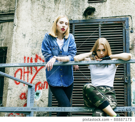couple of teenage girls ouyside on streets chilling, lifestyle people concept 88887173
