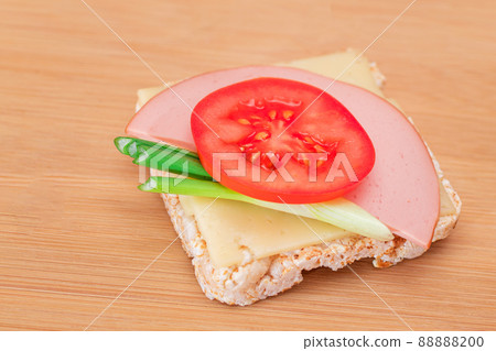 Rice Cake Sandwich with Tomato, Sausage, Green Onions and Cheese Rice Cake Sandwich with Tomato, Sausage, Green Onions and Cheese 88888200