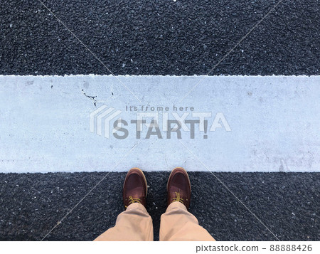 Preparing to start on the pedestrian crossing 88888426