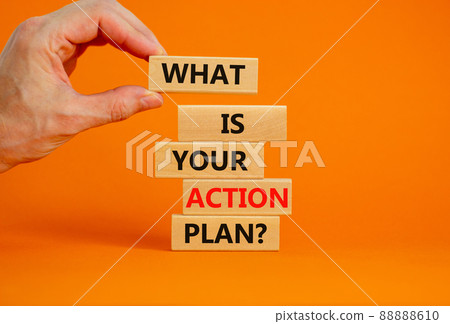 Action plan symbol. Concept words What is your action plan on wooden blocks. Businessman hand. Beautiful orange table orange background. Business What is your action plan concept. Copy space. Action plan symbol. Concept words What is your action plan on wooden blocks. Businessman hand. Beautiful orange table orange background. Business What is your action plan concept. Copy space. 88888610
