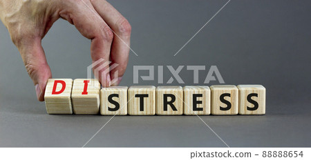 Stress or distress symbol. Psychologist turns cubes and changes the concept word Stress to Distress. Beautiful grey table grey background, copy space. Psychlogical distress or stress concept. Stress or distress symbol. Psychologist turns cubes and changes the concept word Stress to Distress. Beautiful grey table grey background, copy space. Psychlogical distress or stress concept. 88888654