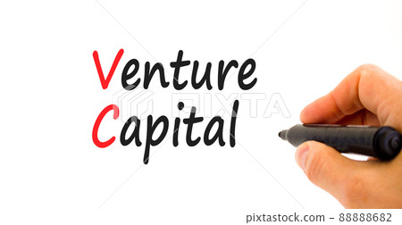 VC venture capital abbraviation symbol. Concept words VC venture capital on white paper. Businessman hand with marker. Beautiful white background. Copy space. Business and VC venture capital concept. 88888682