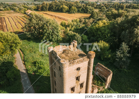 Aerial View Remains Of Yastrzhembsky Estate And Park Complex. Top View Of Old Five-storey Brick Water Tower. Drone View Of Beautiful European Nature From High Attitude In Summer Season. Bird's Eye 88888979
