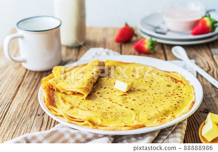 Thin pancakes with homemade strawberry yogurt sauce 88888986