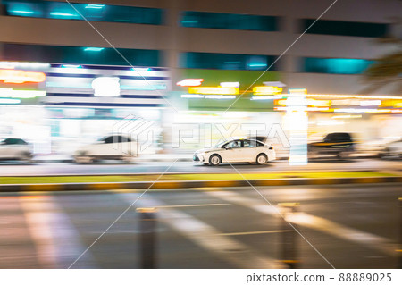 Speeding Taxi Car Fast Driving In City Street. Motion Blur Background Speeding Taxi Car Fast Driving In City Street. Motion Blur Background 88889025