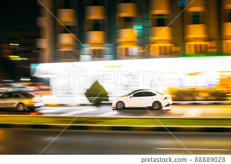 Speeding Car Fast Driving In City Street. Motion Blur Background Speeding Car Fast Driving In City Street. Motion Blur Background 88889028