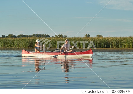 Canoeing in a natural environment Canoeing in a natural environment 88889679