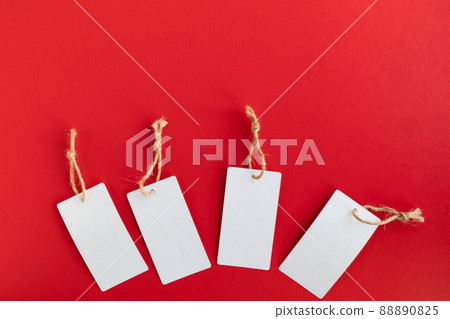 Four labels on a red background with space for text. Banner, poster, showcase. 88890825