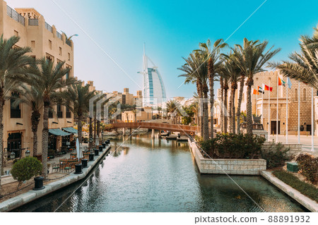 View of hotel Burj Al Arab from Madinat Jumeirah. Madinat Jumeirah the Arabian Resort - Dubai is a 5 star resort in Dubai. It is the largest resort in the Emirate View of hotel Burj Al Arab from Madinat Jumeirah. Madinat Jumeirah the Arabian Resort - Dubai is a 5 star resort in Dubai. It is the largest resort in the Emirate 88891932