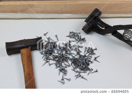 Canvas upholstery, tax, hammer and canvas Canvas upholstery, tax, hammer and canvas 88894805