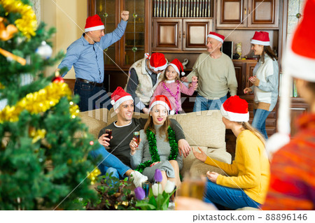 Happy big family is meeting for celebration New Year together at home Happy big family is meeting for celebration New Year together at home 88896146