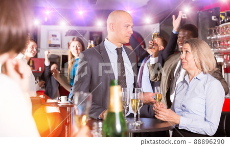 Man and woman drinking alcohol on party Man and woman drinking alcohol on party 88896290
