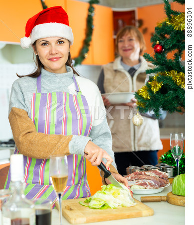 Family preparing christmas dinner 88896304