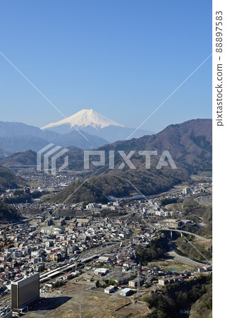 Mt. Fuji and Otsuki city area seen from Mt. Iwaden (Otsuki city, Yamanashi prefecture) 88897583