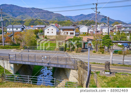 Looking toward Road Station Ai Land Udatsu from the bank of the Yoshino River in Wakimachi, Mima City, Tokushima Prefecture in spring Looking toward Road Station Ai Land Udatsu from the bank of the Yoshino River in Wakimachi, Mima City, Tokushima Prefecture in spring 88902469