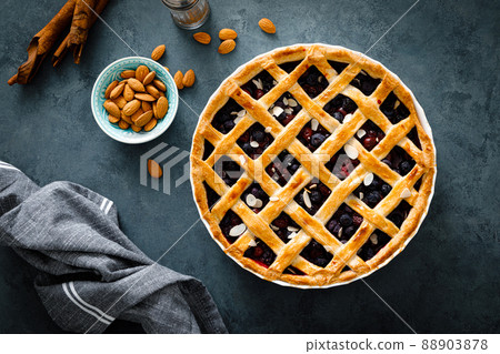 Almond and berry pie with lattice pastry, flat lay, top view Almond and berry pie with lattice pastry, flat lay, top view 88903878