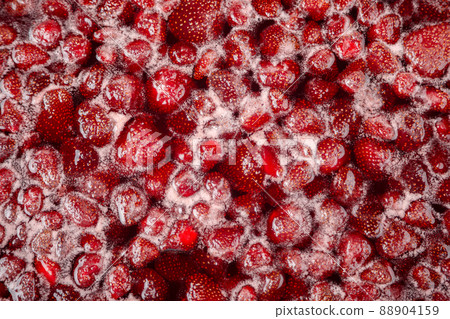 Cooking strawberry jam close up. Cooking strawberry jam close up. 88904159
