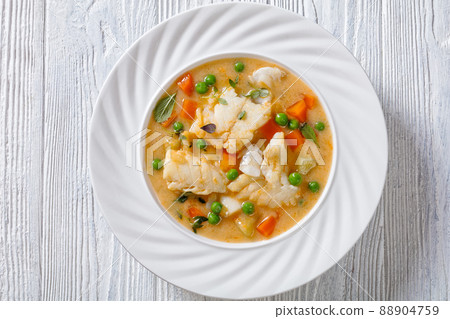 white fish chowder with green peas, potatoes white fish chowder with green peas, potatoes 88904759