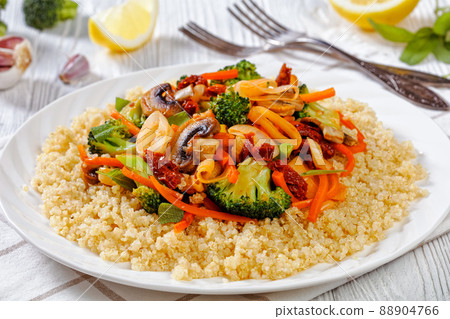 quinoa with fried veggies, mushrooms on plate quinoa with fried veggies, mushrooms on plate 88904766