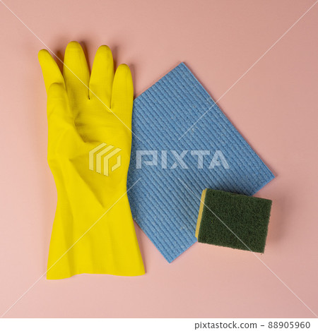a yellow rubber cleaning glove a yellow rubber cleaning glove 88905960