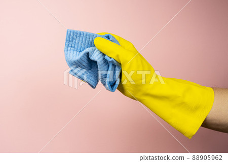 a yellow rubber cleaning glove a yellow rubber cleaning glove 88905962