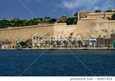 Valletta, Malta waterfront houses on The Grand Harbour below fortifications. Valletta, Malta waterfront houses on The Grand Harbour below fortifications. 88907928