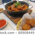 Chilli crab and fried manju 88908449