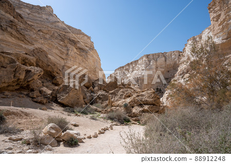 Trail head of the Canyon of Ein Avdat National Park, oasis in the Negev Desert, Southern Israel, Text is Trail head of the Canyon of Ein Avdat National Park, oasis in the Negev Desert, Southern Israel, Text is 88912248