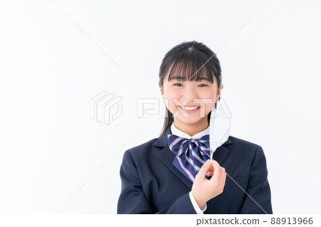 Junior high school girl removing the mask 88913966