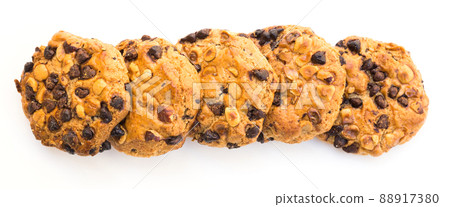 cookies with chocolate and hazelnuts on a white background cookies with chocolate and hazelnuts on a white background 88917380