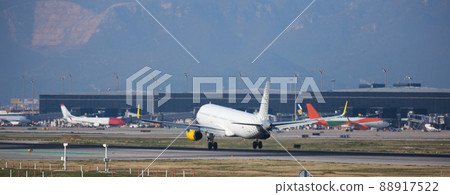passenger plane lands at airport passenger plane lands at airport 88917522